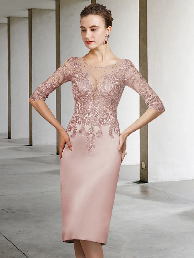 Close-up of the jewel neck and intricate lace applique details on the elegant light blue dress.