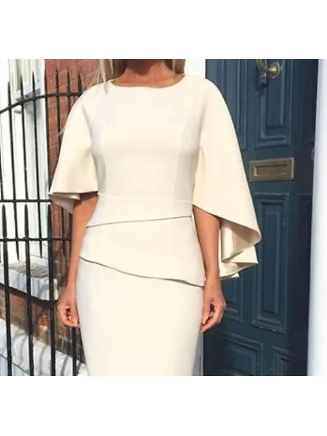 Knee-length Charmeuse dress with tiered detail, side view.