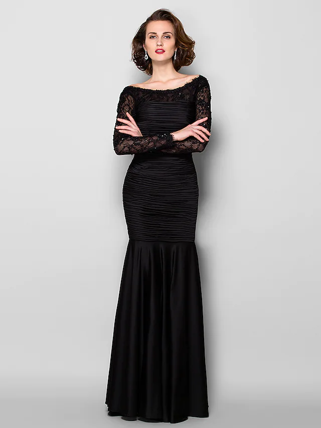 Side view of elegant long sleeve lace jersey dress.