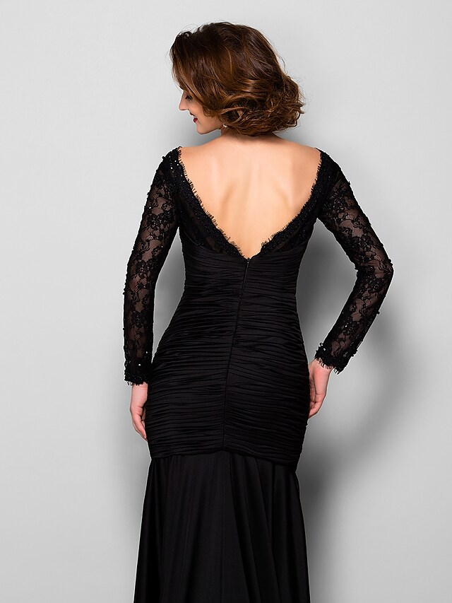 Detail of the lace jersey fabric on the dress.