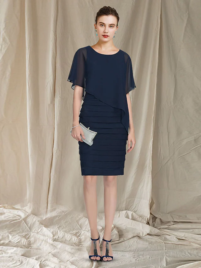 Side view of the sleeveless chiffon Mother of the Bride dress.