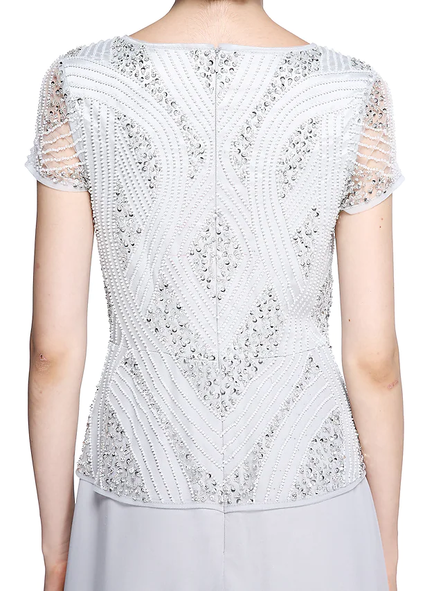 Detail of the beading and sequin embellishments on the dress.