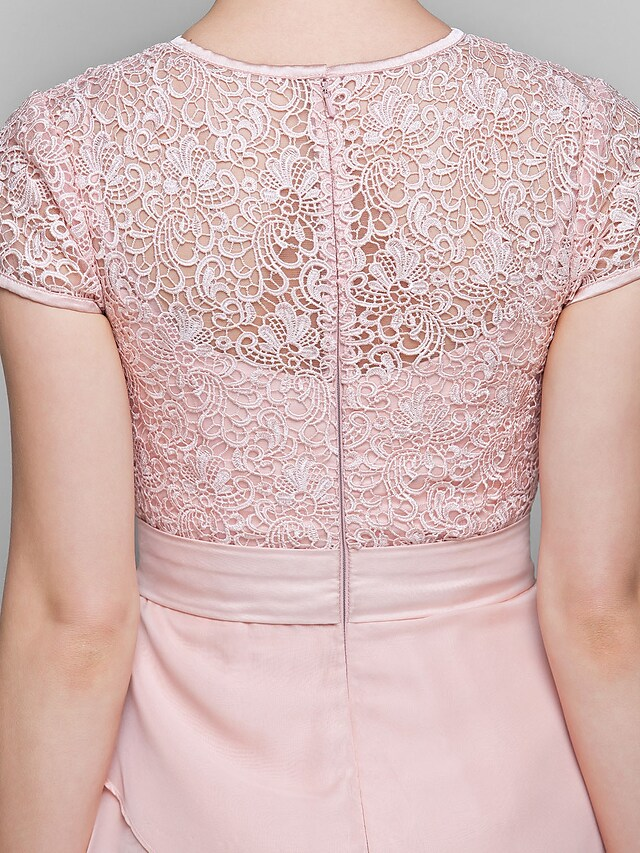 Close-up of the jewel neckline and subtle lace embellishments.