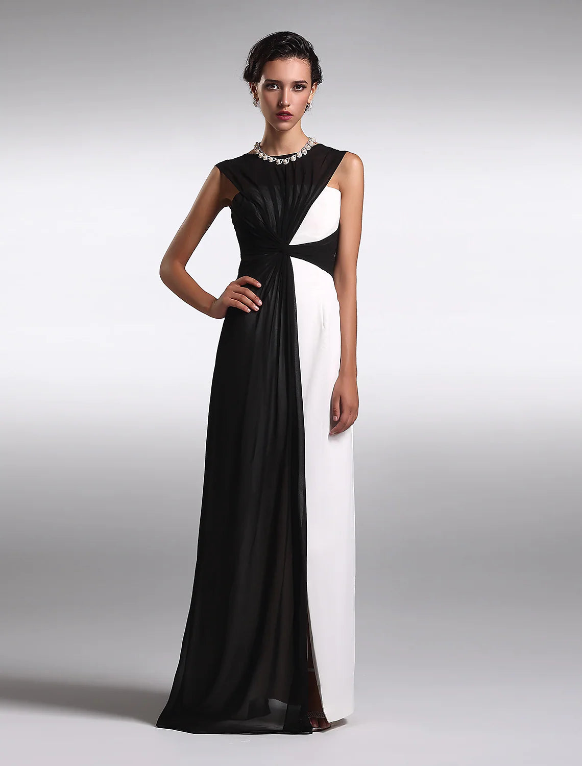 Elegant black sheath prom dress with jewel neck and ruched details.
