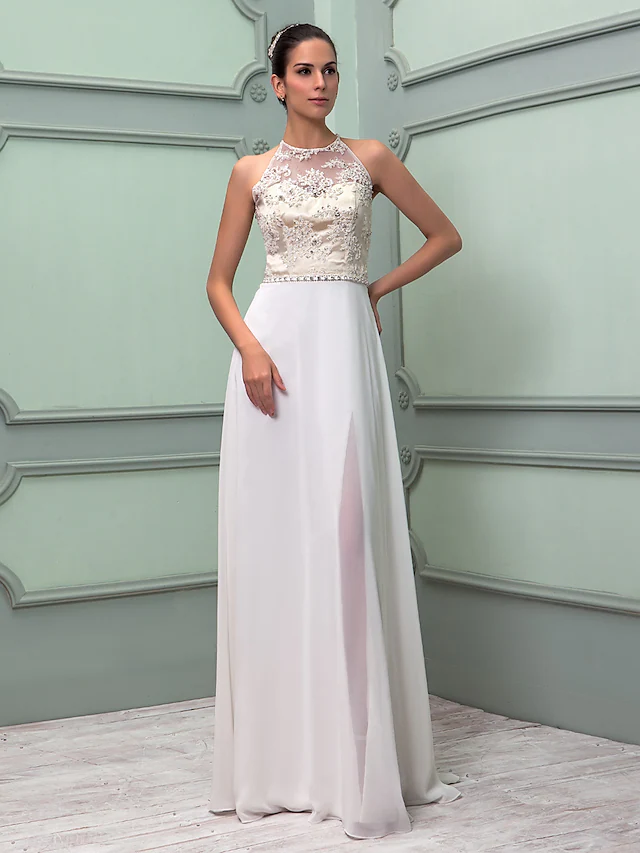 Elegant sheath wedding dress with jewel neck and floor length silhouette.