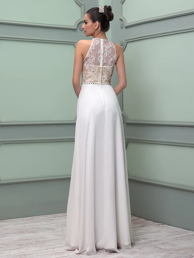 Full length view of the wedding dress highlighting the lace and chiffon fabric.