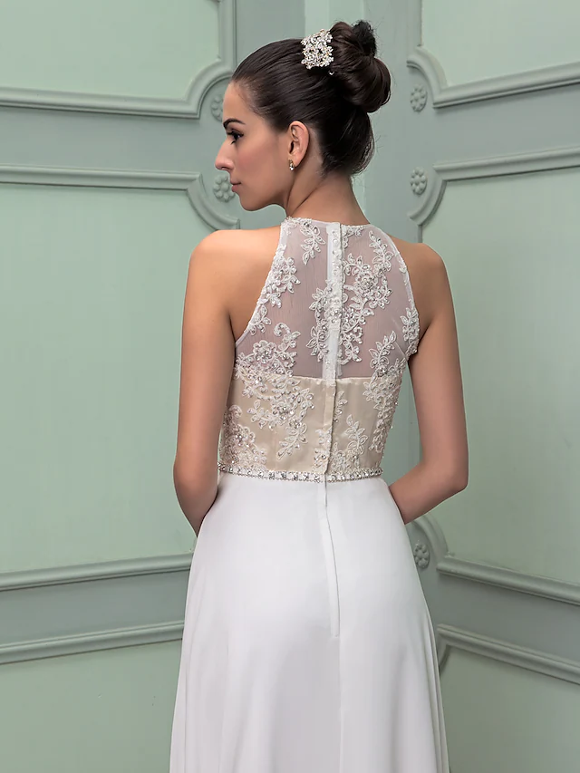 Wedding dress with a flowing floor-length skirt and elegant regular straps.