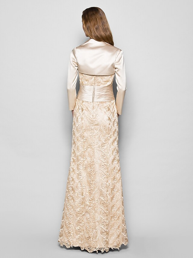 Side view of the elegant sheath Mother of the Bride dress, showing the ruched satin fabric.