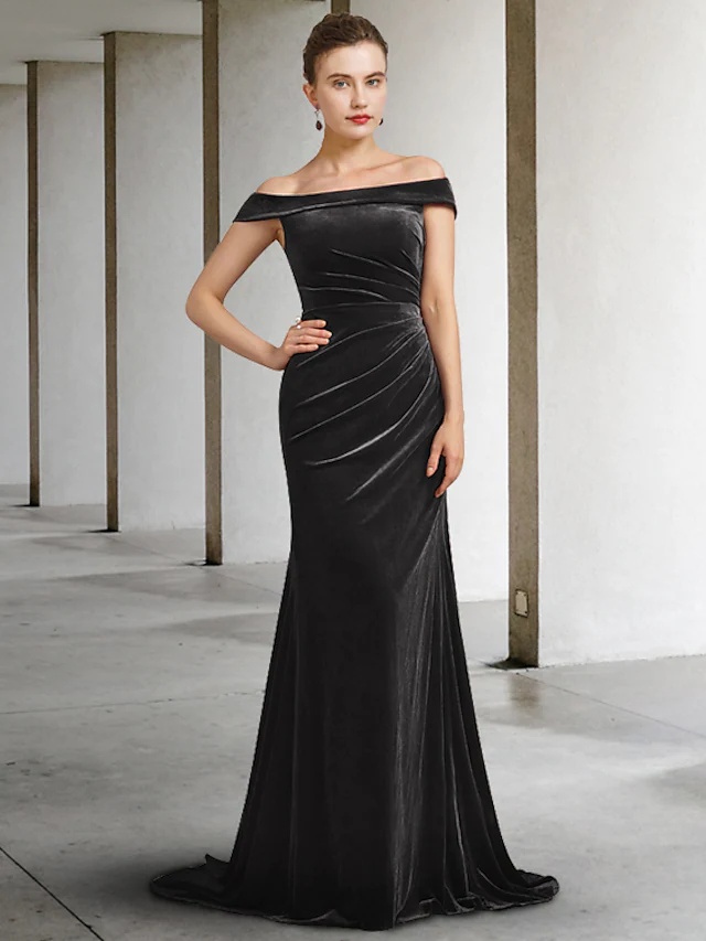 Elegant off-shoulder velvet Mother of the Bride dress with draping.