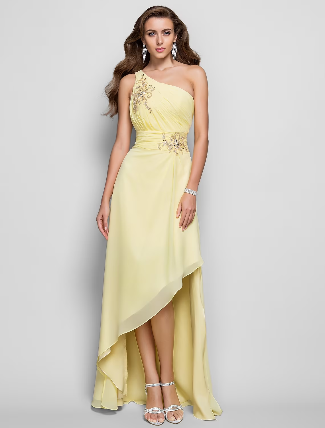 Side view of the sheath dress highlighting the asymmetrical design and slit.