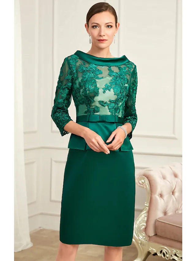 Close-up of the jewel neck and 3/4 sleeve on the chiffon dress.