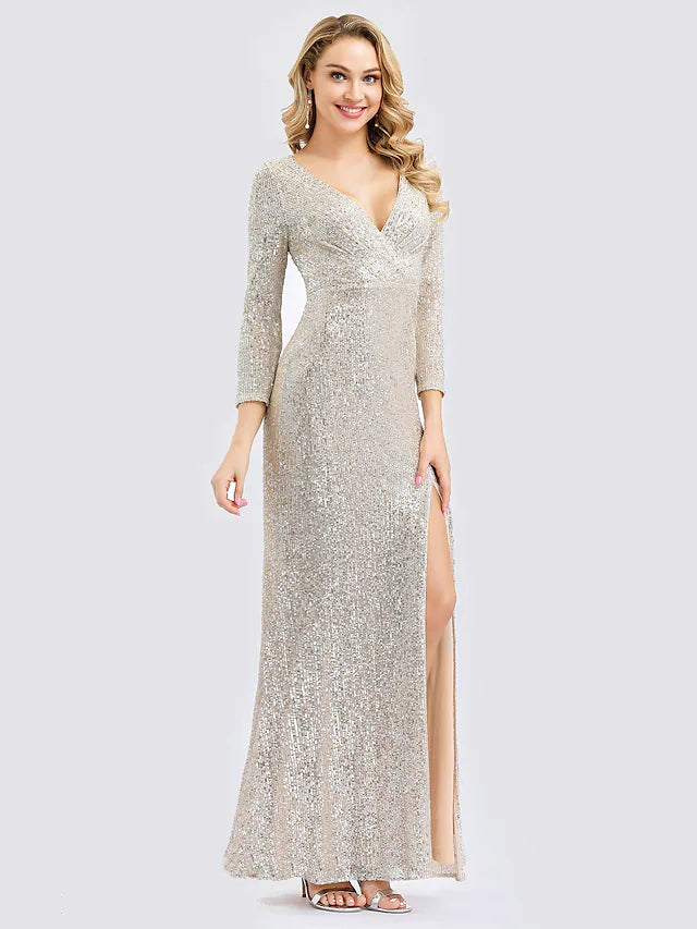 Elegant sequined sheath evening dress with plunging neckline and long sleeves.