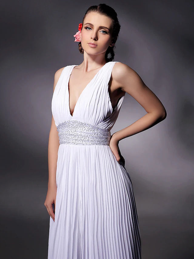 Close-up of the intricate beading and chiffon fabric on the elegant prom dress.