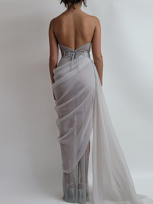 Full view of a sleeveless organza gown with delicate ruched details.