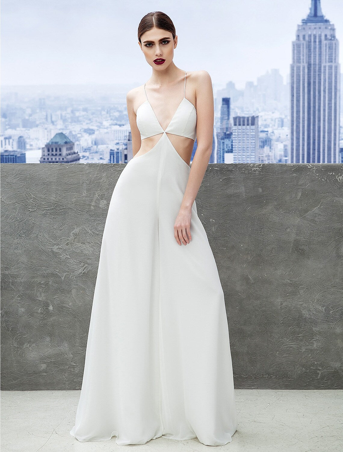 Elegant pleated chiffon sheath dress with spaghetti straps.