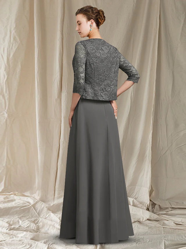 Back view of the sleeveless Mother of the Bride dress with a flowing wrap.