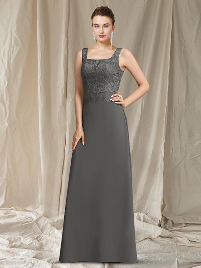 Side profile of the chiffon lace Mother of the Bride gown, showing the floor length.