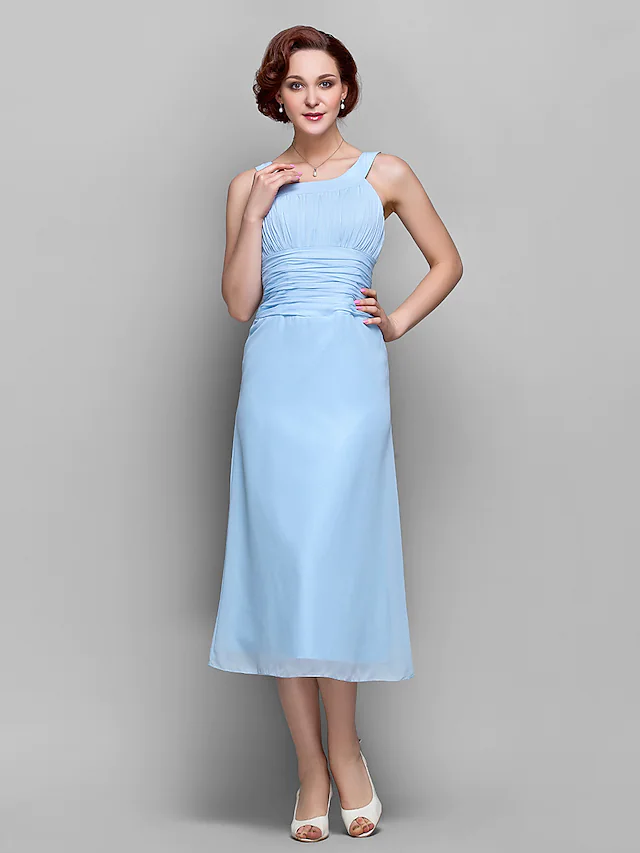 Elegant tea-length chiffon Mother of the Bride dress with ruched draping and straps.