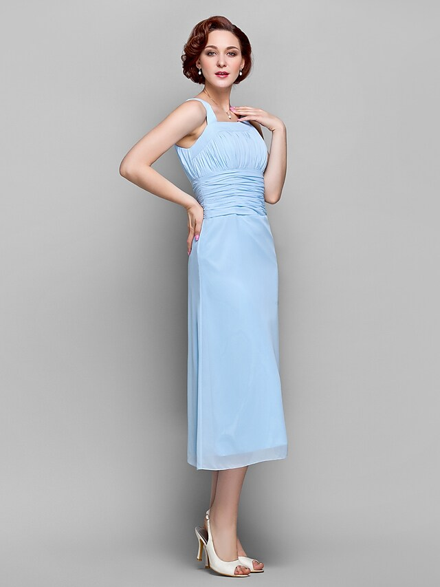 Back view of a tea-length Mother of the Bride dress.