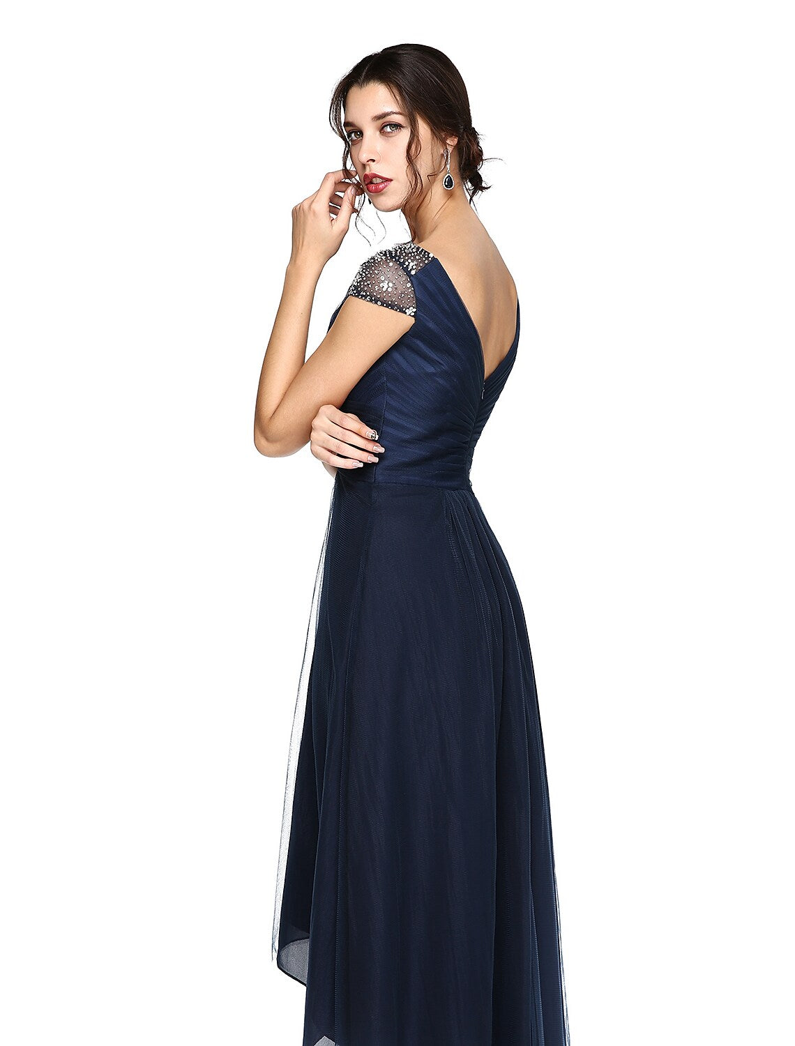 Model posing in the elegant V-neck sheath dress for formal occasions.