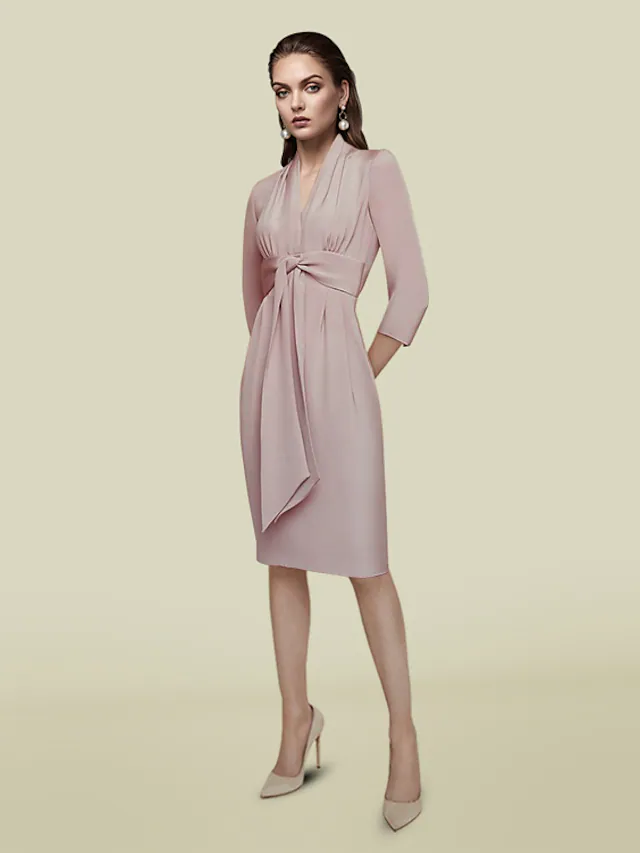 Side view of the elegant V-neck charmeuse dress, showing the knee-length hem and 3/4 sleeves.