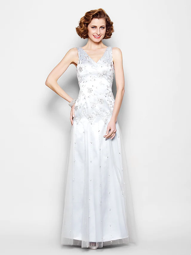Side view of the floor-length Mother of the Bride dress.