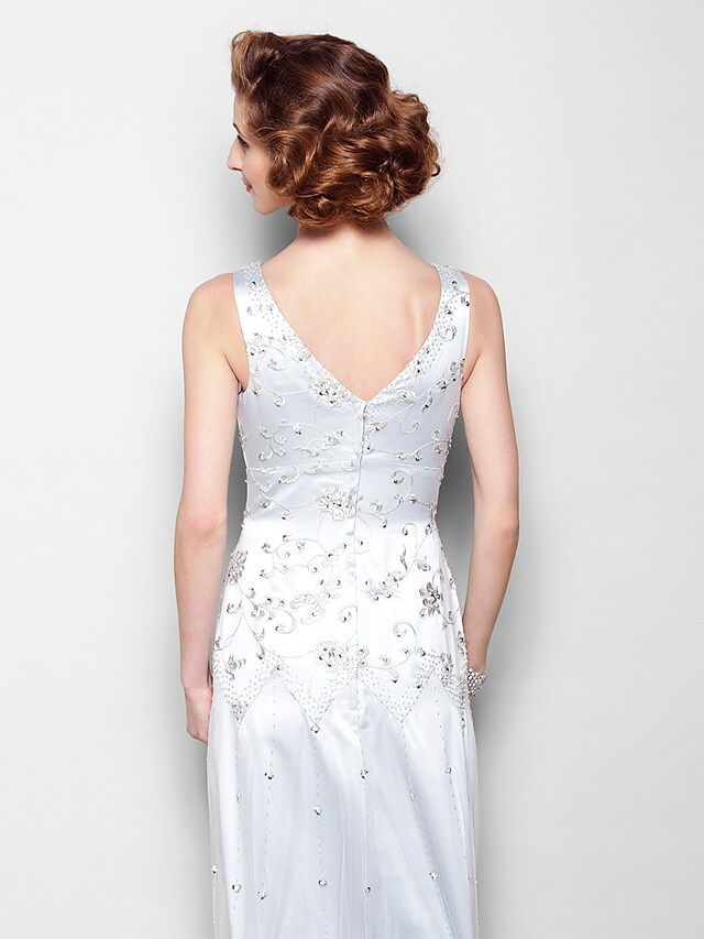 Full length view of the sparkling lace tulle dress.