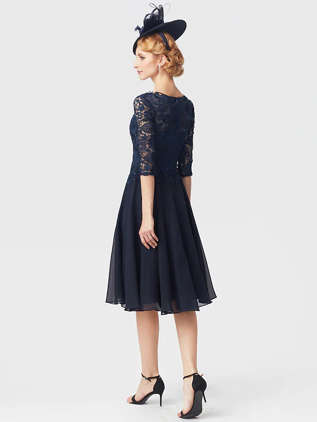 Side view of the knee-length chiffon lace dress with half sleeves.