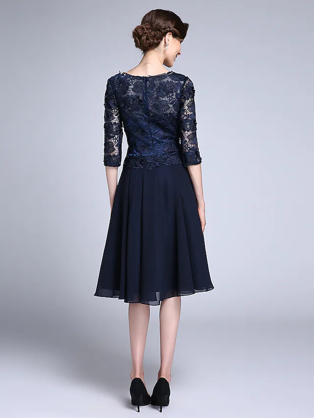 Model in the mother of the bride dress, demonstrating movement.