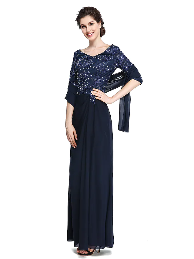Close-up of the lace and chiffon fabric on the elegant Mother of the Bride dress.