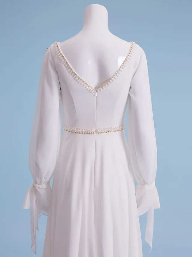 Graceful chiffon wedding dress with beading and court train.