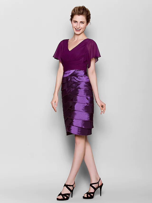 Side view of chiffon taffeta formal gown.