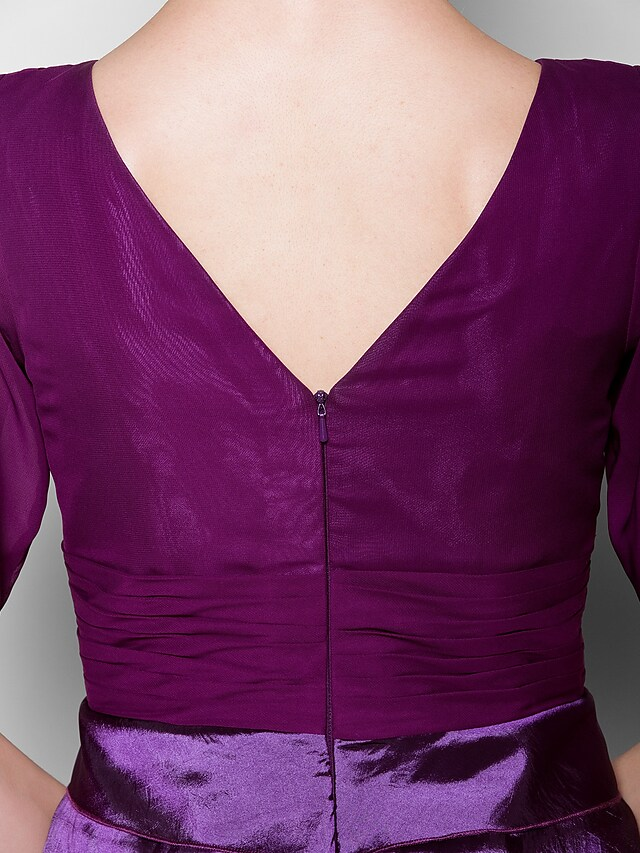 Detail of chiffon taffeta fabric and dress silhouette.