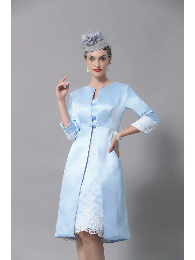 Elegant plus size Mother of the Bride dress with V-neck and lace.