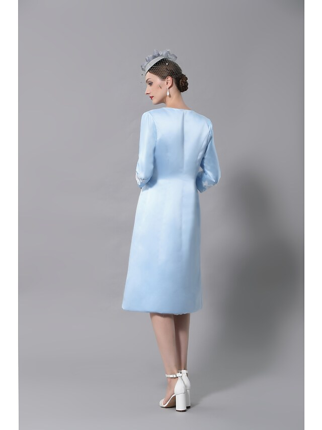 Plus size vintage V-neck dress, front view.