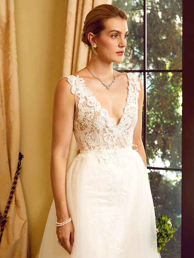 Another angle of the elegant wedding dress, showing the overall design and fit.