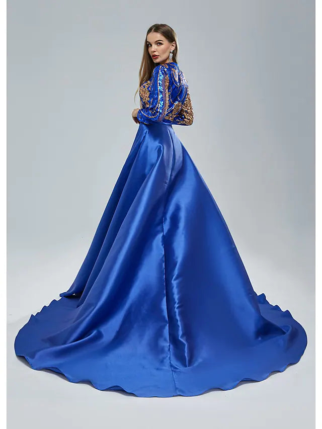 Model posing in a silver sequined formal gown with short sleeves.