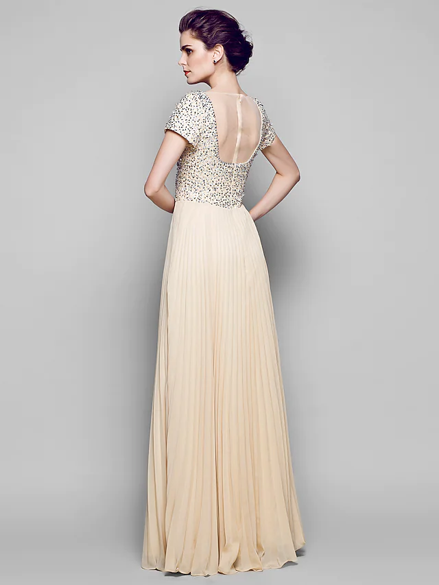 Side view of the sequined chiffon A-line gown, highlighting its graceful silhouette.
