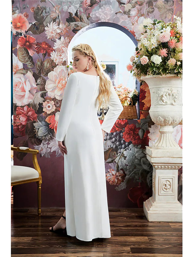 Back view of the sparkling A-line long sleeve evening gown.