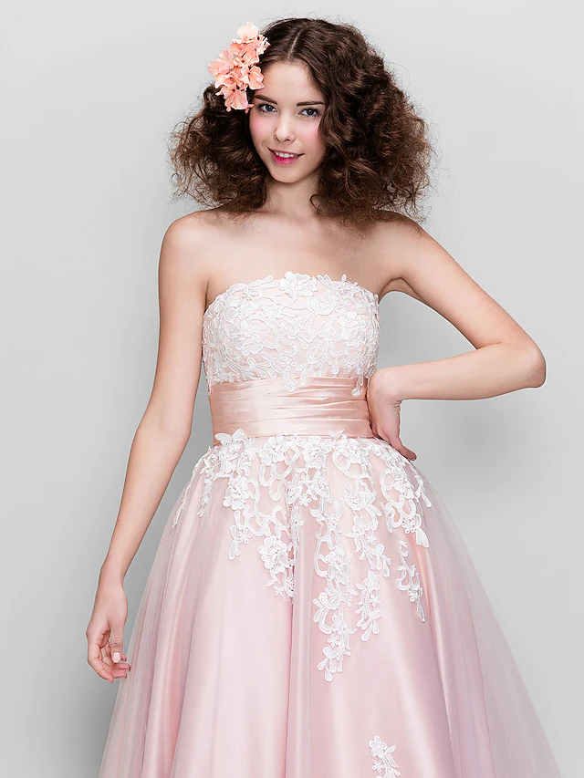 Side view of ankle-length prom dress.