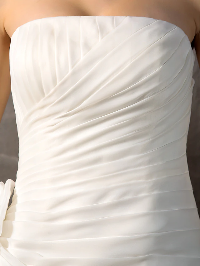 Another angle of the strapless wedding gown, showing its unique ruffle details.