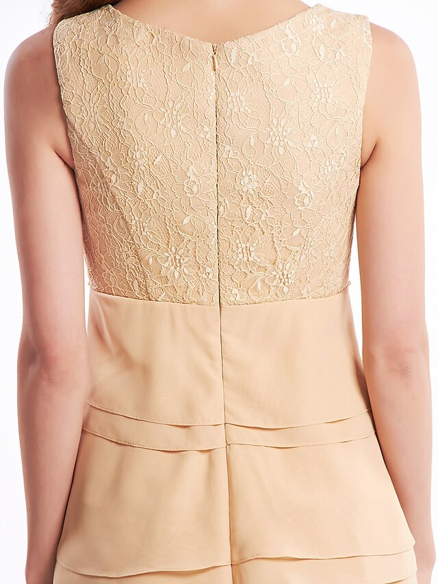 Detail of the flowing chiffon skirt on the special occasion dress.