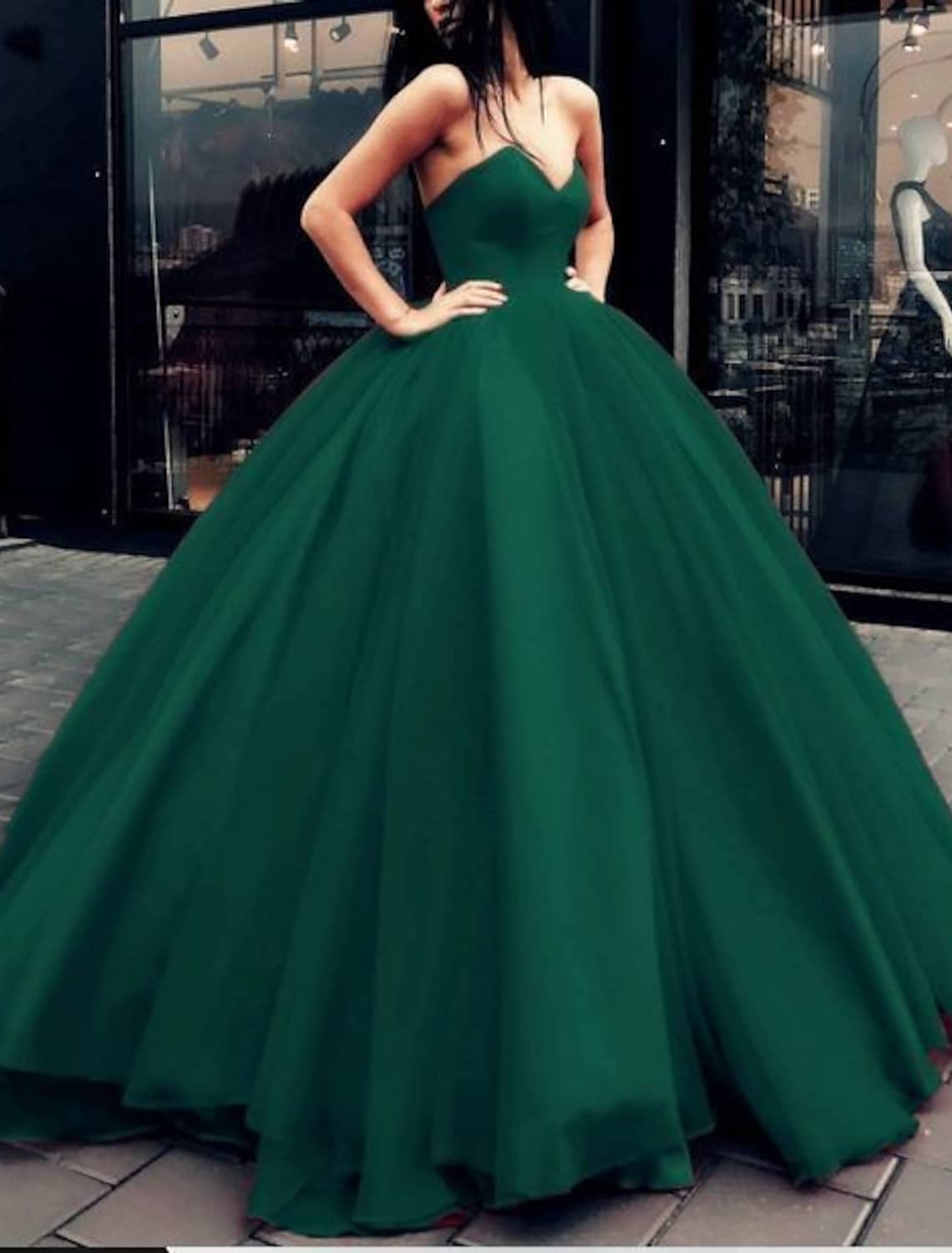 Back view of the strapless tulle ball gown, highlighting the beautiful back design.