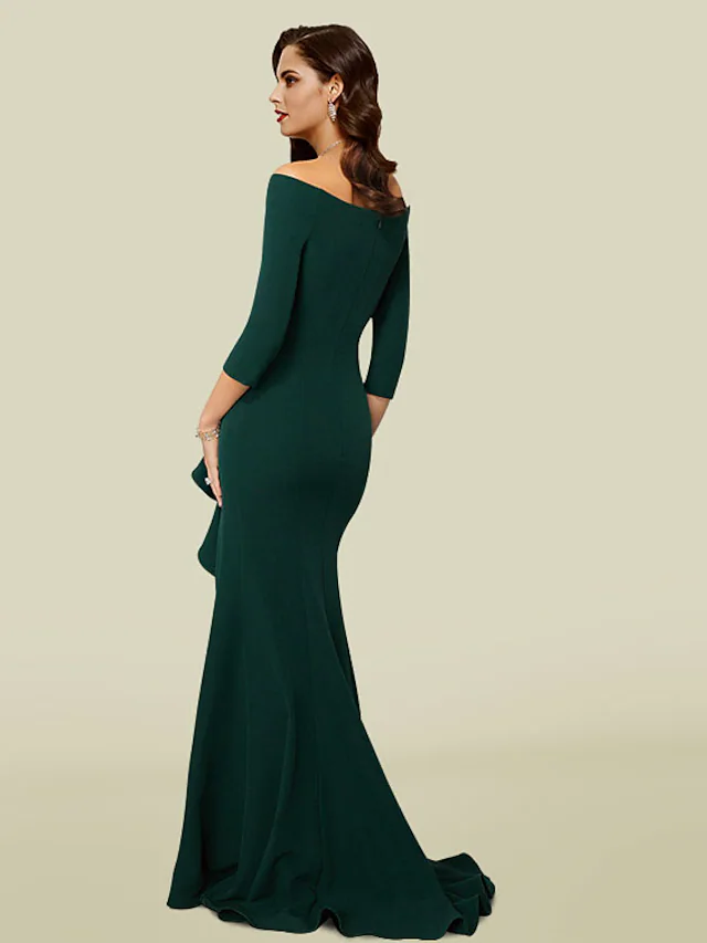 Mermaid trumpet mother of the bride dress featuring a court train and elegant draping.