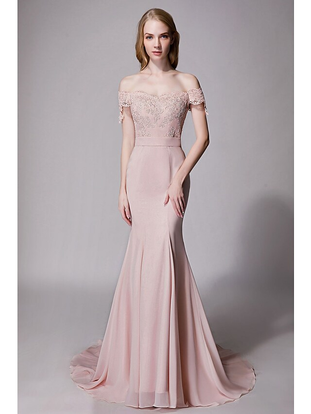 Elegant sweetheart neckline bridesmaid dress with lace details and a flowing court train.