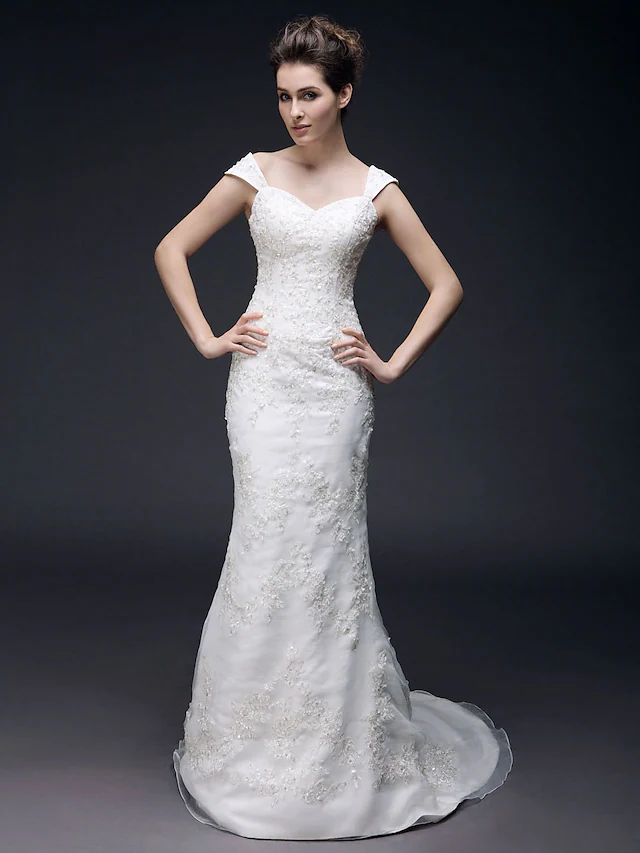 Mermaid wedding dress with sweetheart off-shoulder neckline.