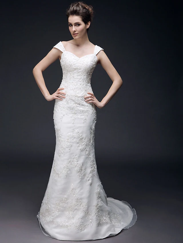 Back view of a mermaid wedding dress with short sleeves.