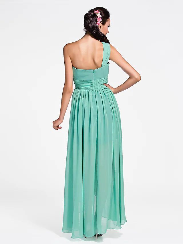 Back view of a flowing ankle-length chiffon bridesmaid dress featuring an open back.