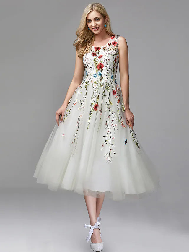 Elegant tea length chiffon prom dress with lace appliques, front view.