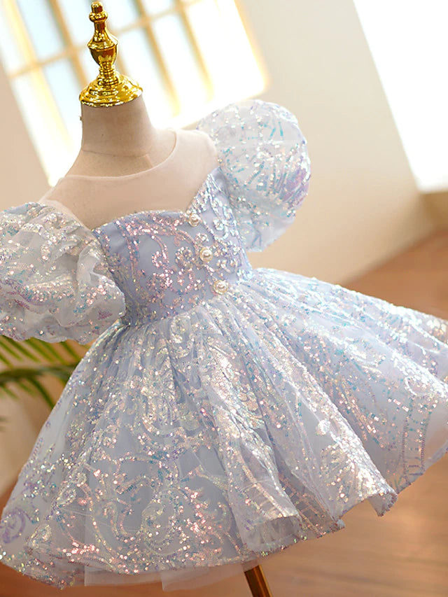 Side profile of the Princess Tulle dress for flower girls.